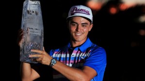 PONTE VEDRA BEACH, FL - MAY 10: Rickie Fowler celebrates with the winner's trophy after the final round of THE PLAYERS Championship at the TPC Sawgrass Stadium course on May 10, 2015 in Ponte Vedra Beach, Florida. (Photo by Sam Greenwood/Getty Images)